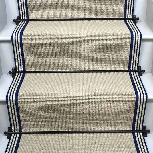 Charter Plain Loop Earl Stair Runner with a navy stripe border and black stair rods. (1)