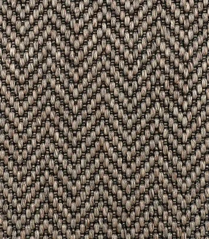 Chevron rug with brown and gray zigzag weave.