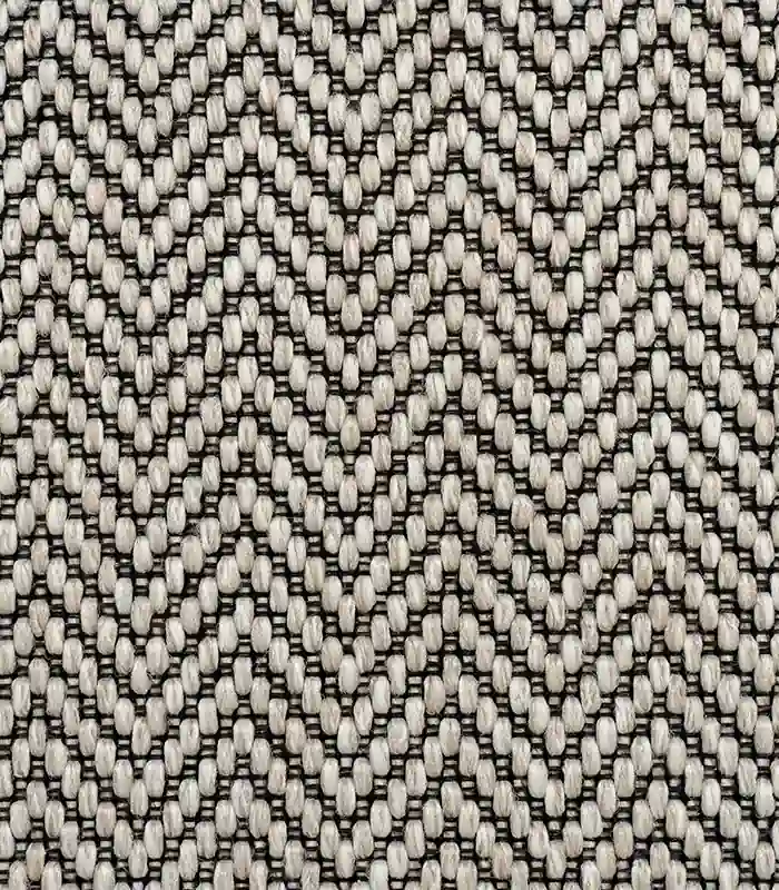 Chevron rug with raised light zigzag texture.