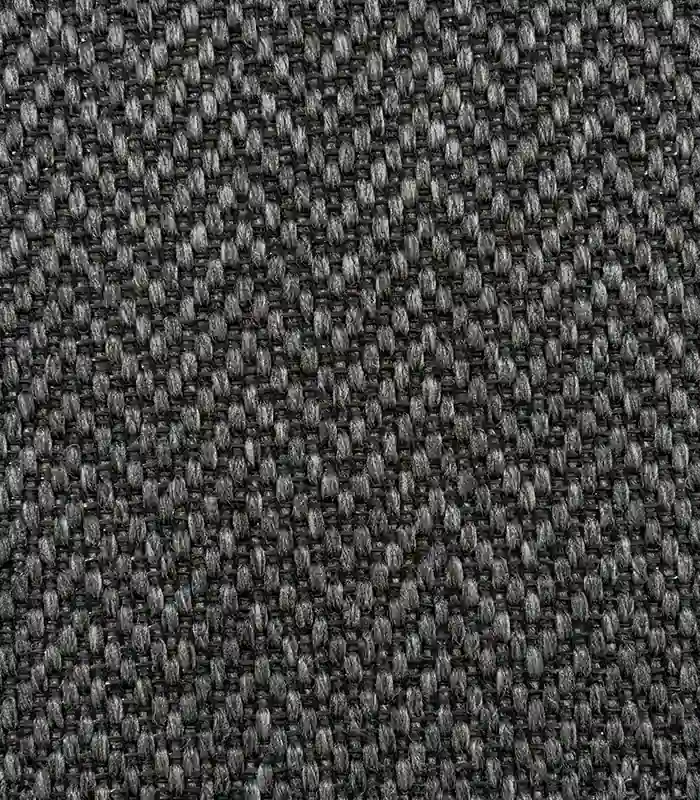 Dark gray and black herringbone-patterned woven rug.