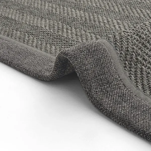 Gray bath mat with ribbed and looped textures