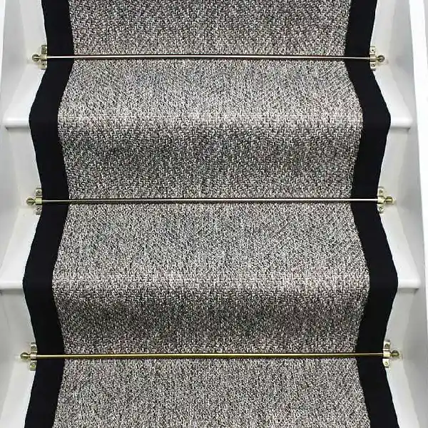 Nature Weave Herringbone Grey Stair runner on a staircase with rods.