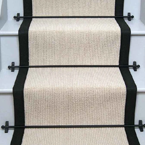 Rib Champagne stair runner with black edging and black stair rods. (1)