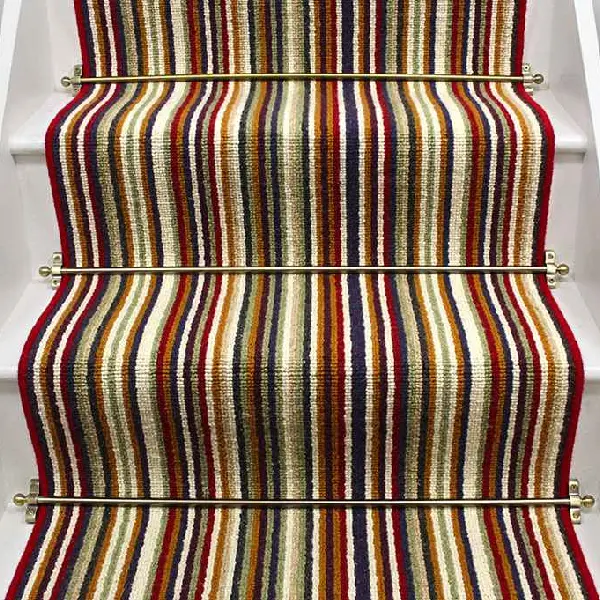Strata wool striped stair runner with multicolored stripes and brass stair rods. (1)
